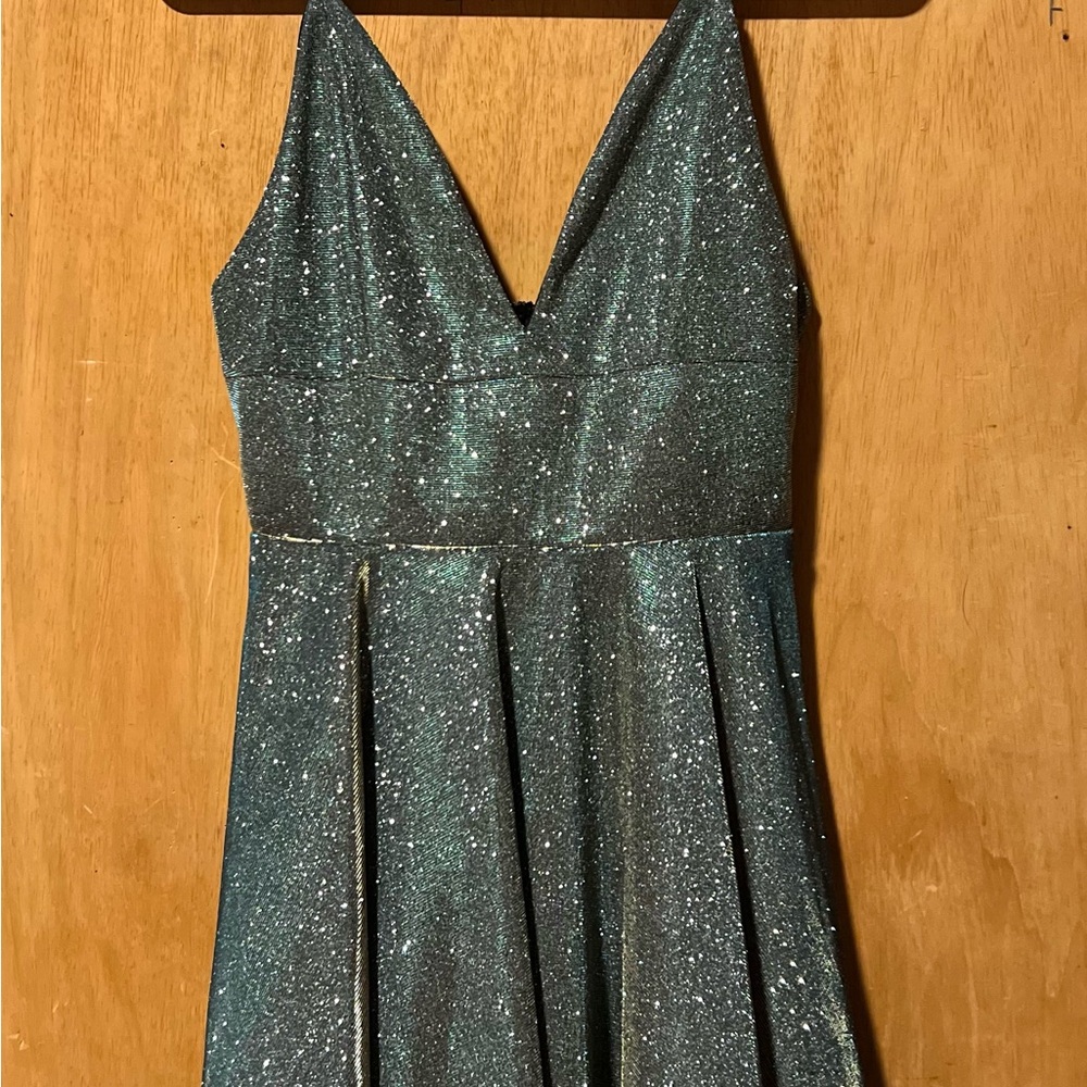 Prom style dress to use maybe in a graduation never worn.